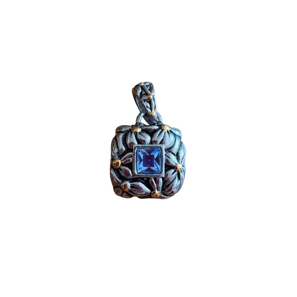 Elegant Aquamarine and Silver Pendant with touches of gold.